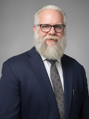 Headshot of Dustin L. Compton